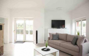 Wunderschöne und moderne Ferienwohnung mit Garten